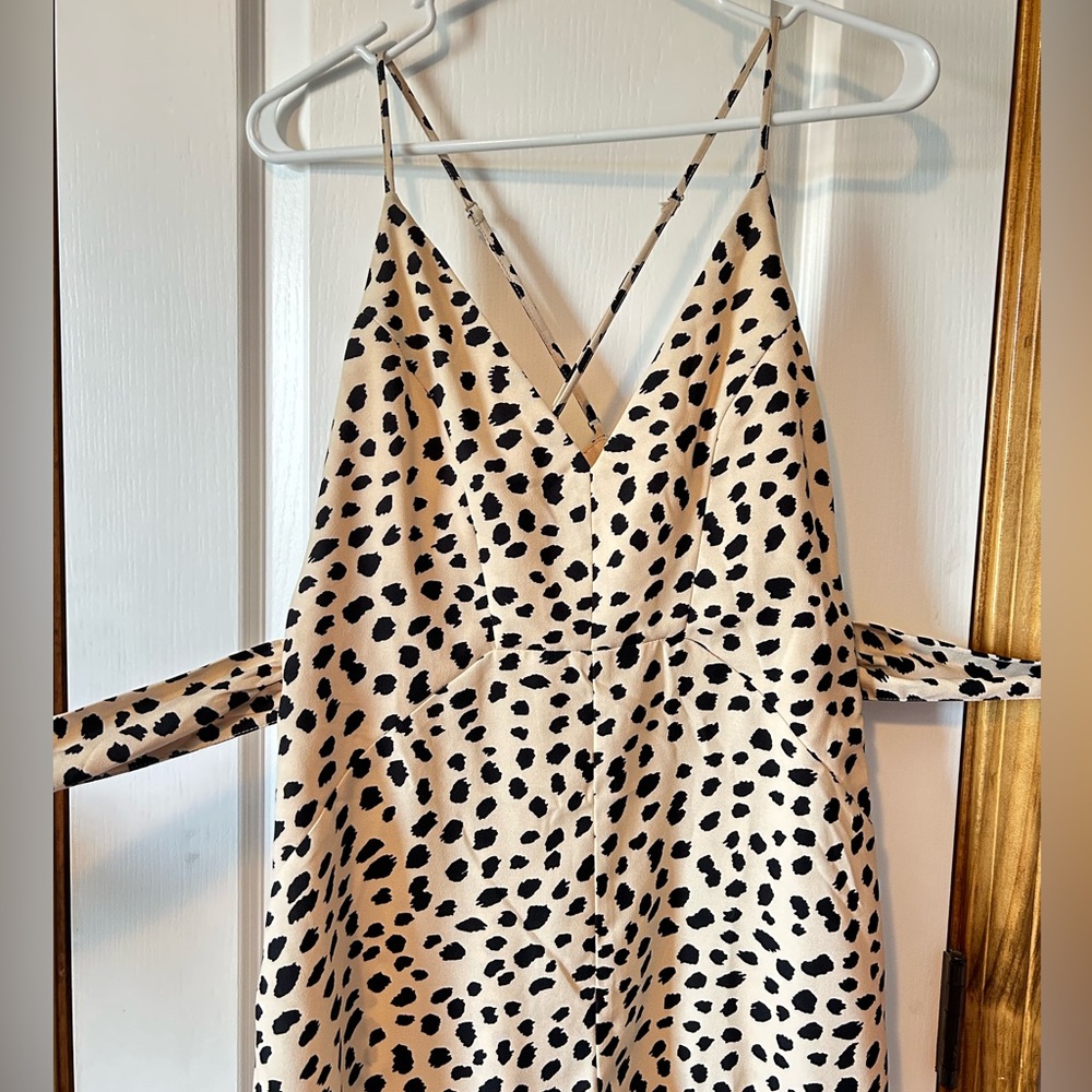 Forever 21 romper. Criss cross back, tie around waist, and side zipper.